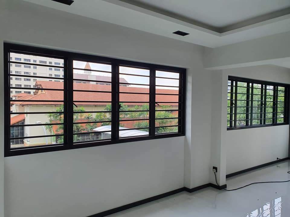 Modern black window grille installed in a residential home